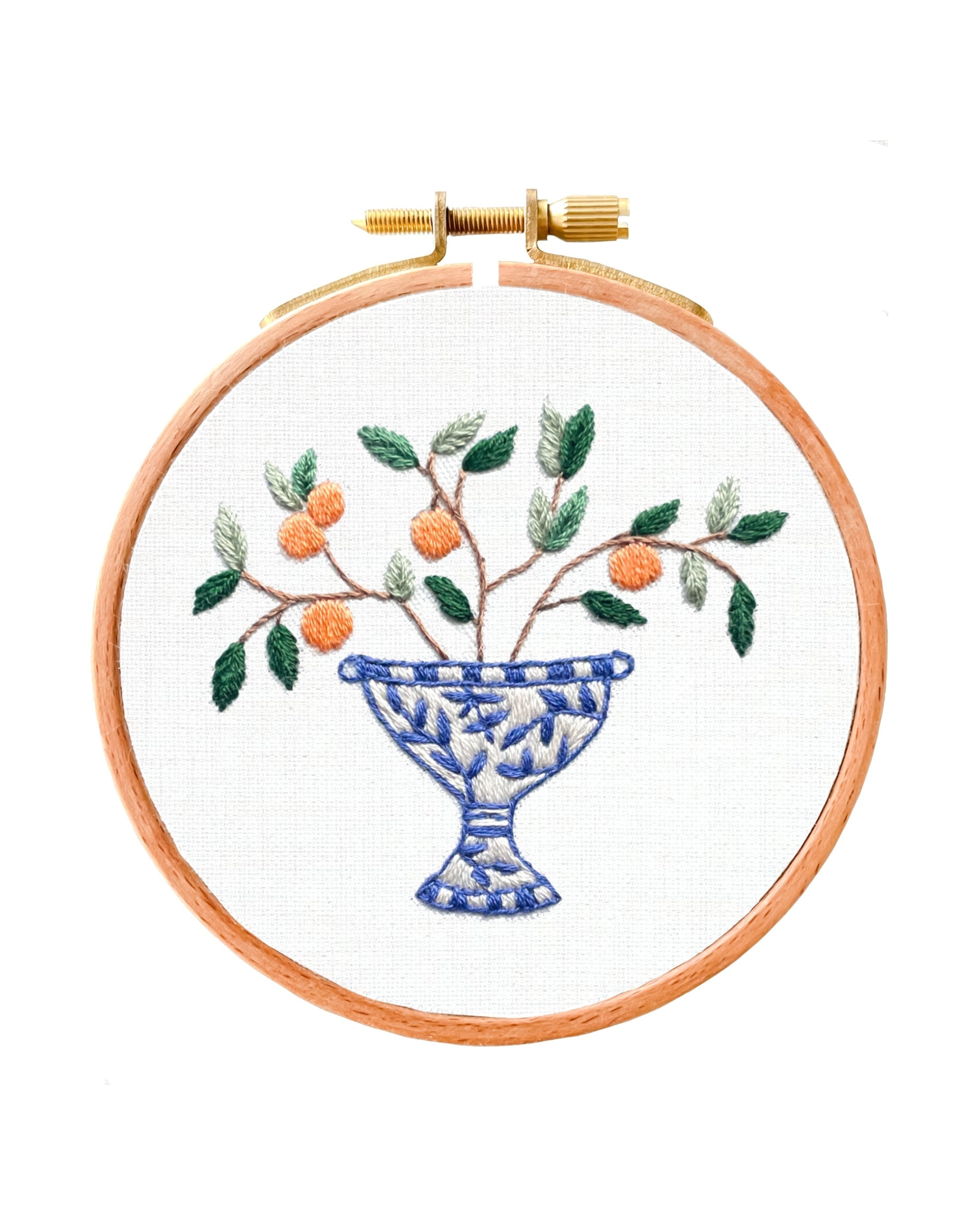 Italian Vase Embroidery design - embroidery floral design with oranges and a blue vase with a white background